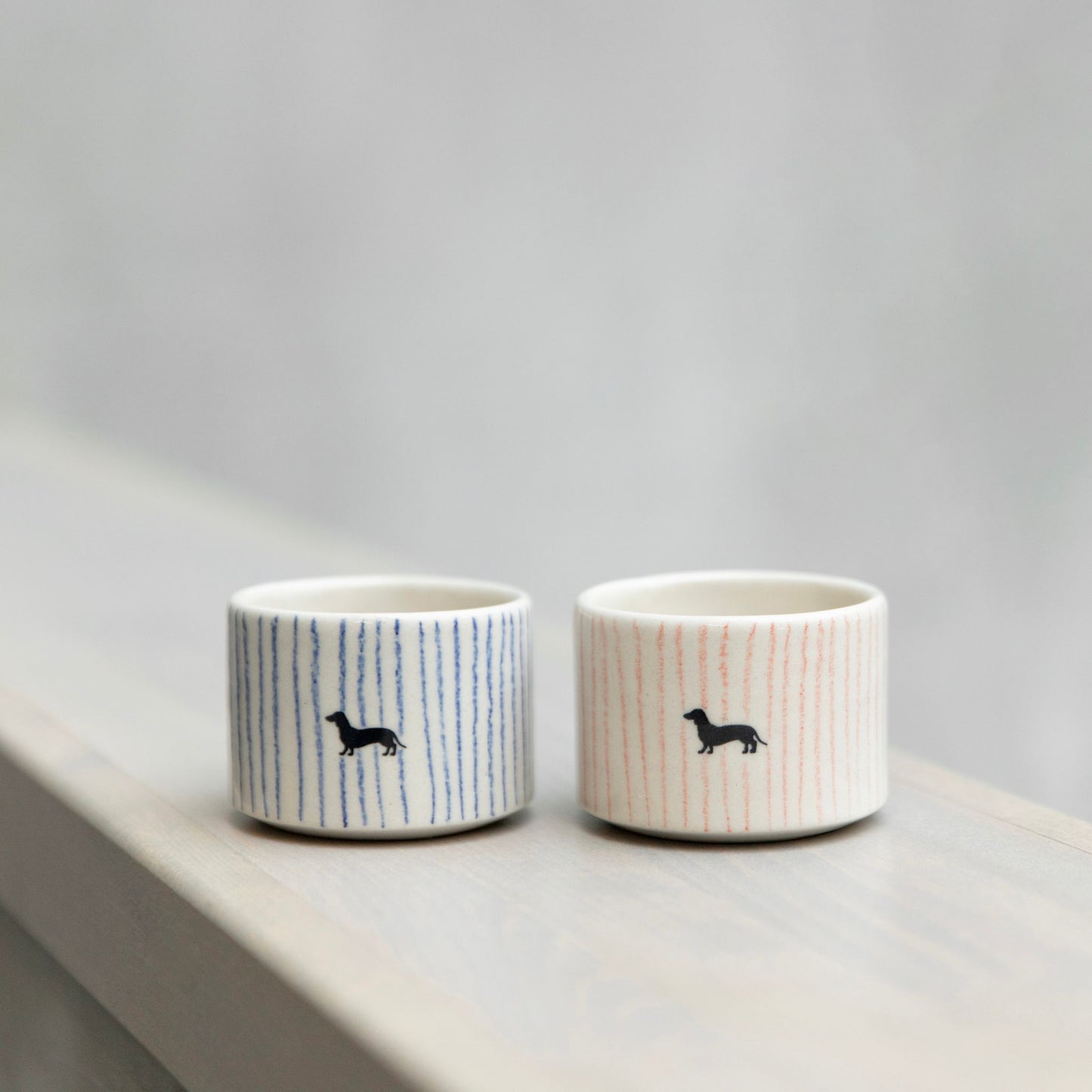 Set dvou kalíšků Červený a modrý pruhovaný jezevčík